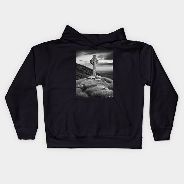 Tall Celtic Cross on the hills of Ireland on a cloudy day in black and white. Kids Hoodie by DesignsbyZazz